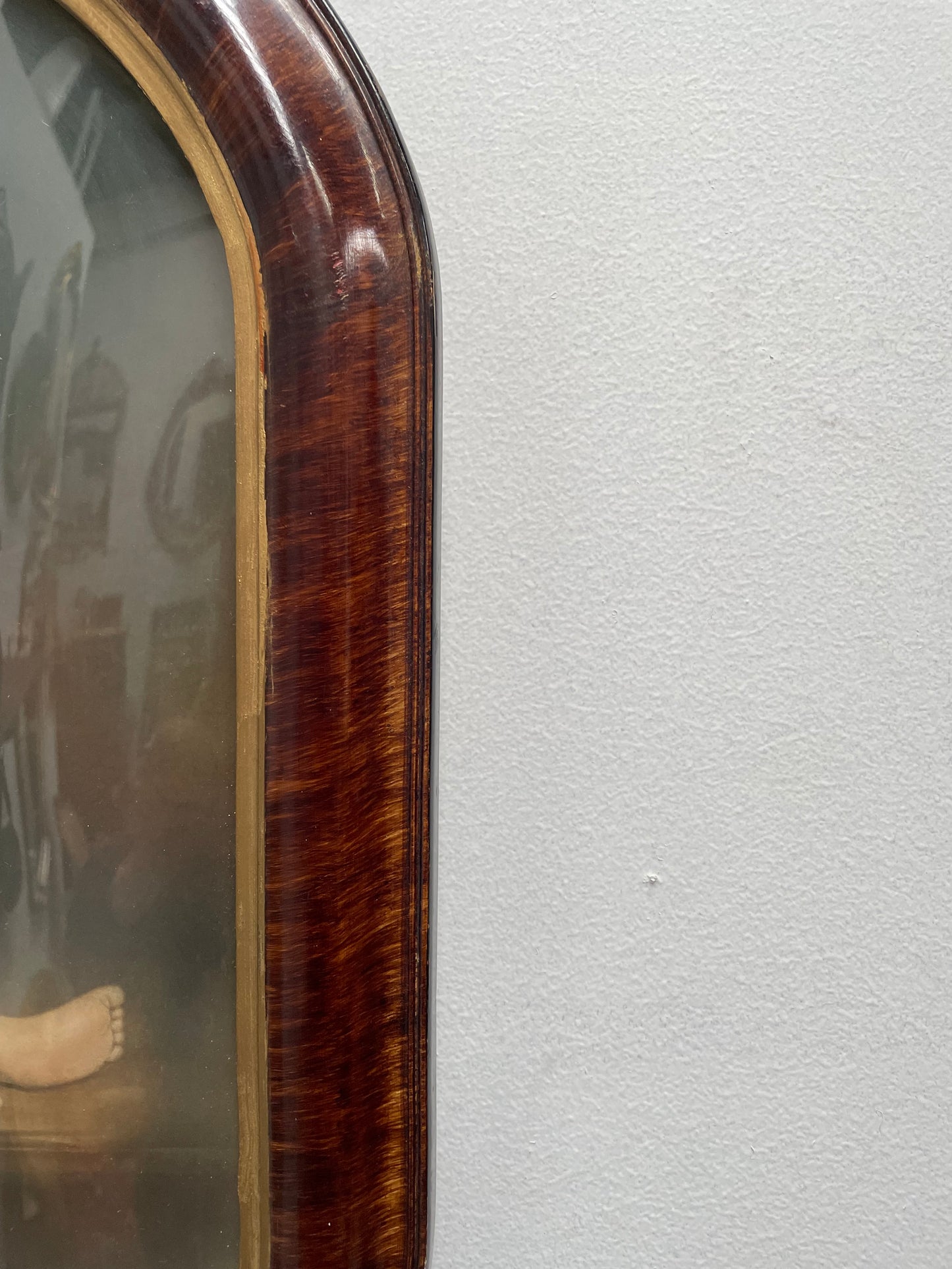 Lovely Art Deco photo frame with concave glass and a beautiful photo of a young child . Ready to hang. Sourced locally and in good original condition.
