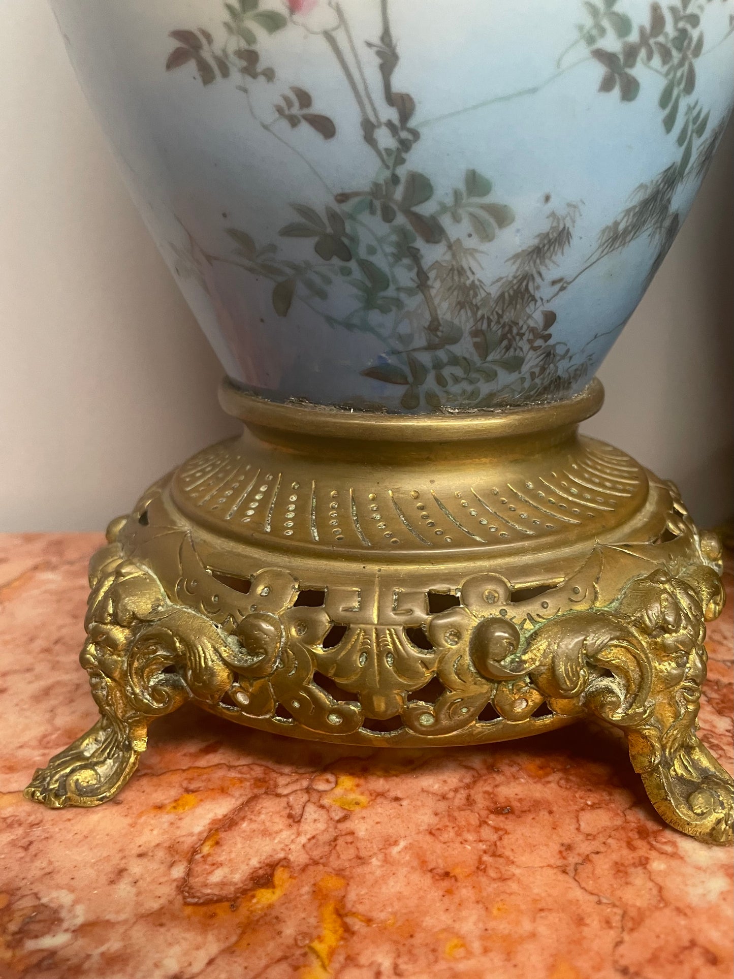 Attractive pair of Japanese urns. Hand painted depicting cranes and with brass mounts. In good original condition. Please see photos as they form part of the description.