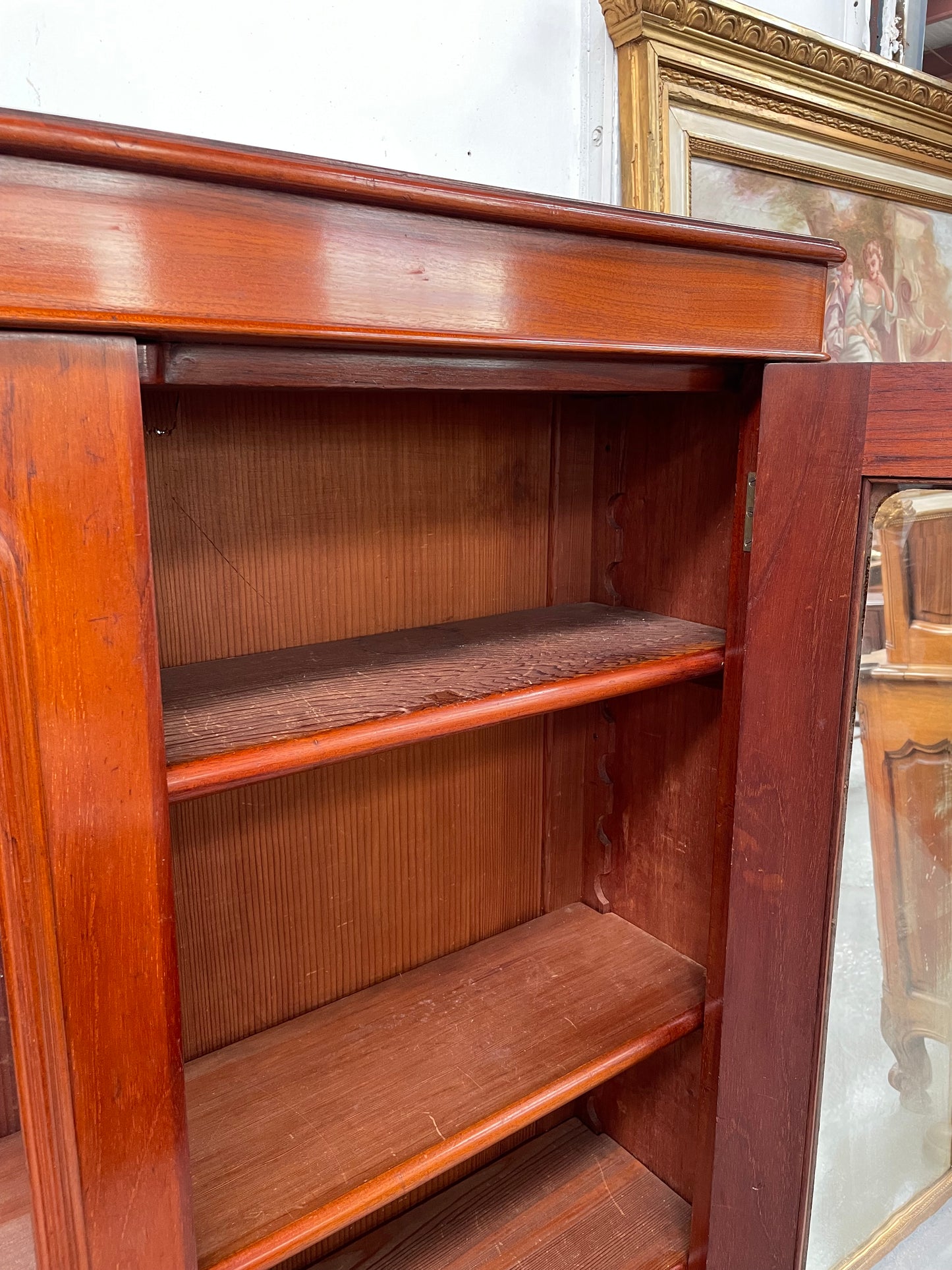 Practical late Victorian Cedar two door bookcase on cabriole feet and adjustable shelves. In good condition. Please see photos as they form part of the description. Circa: 1890's