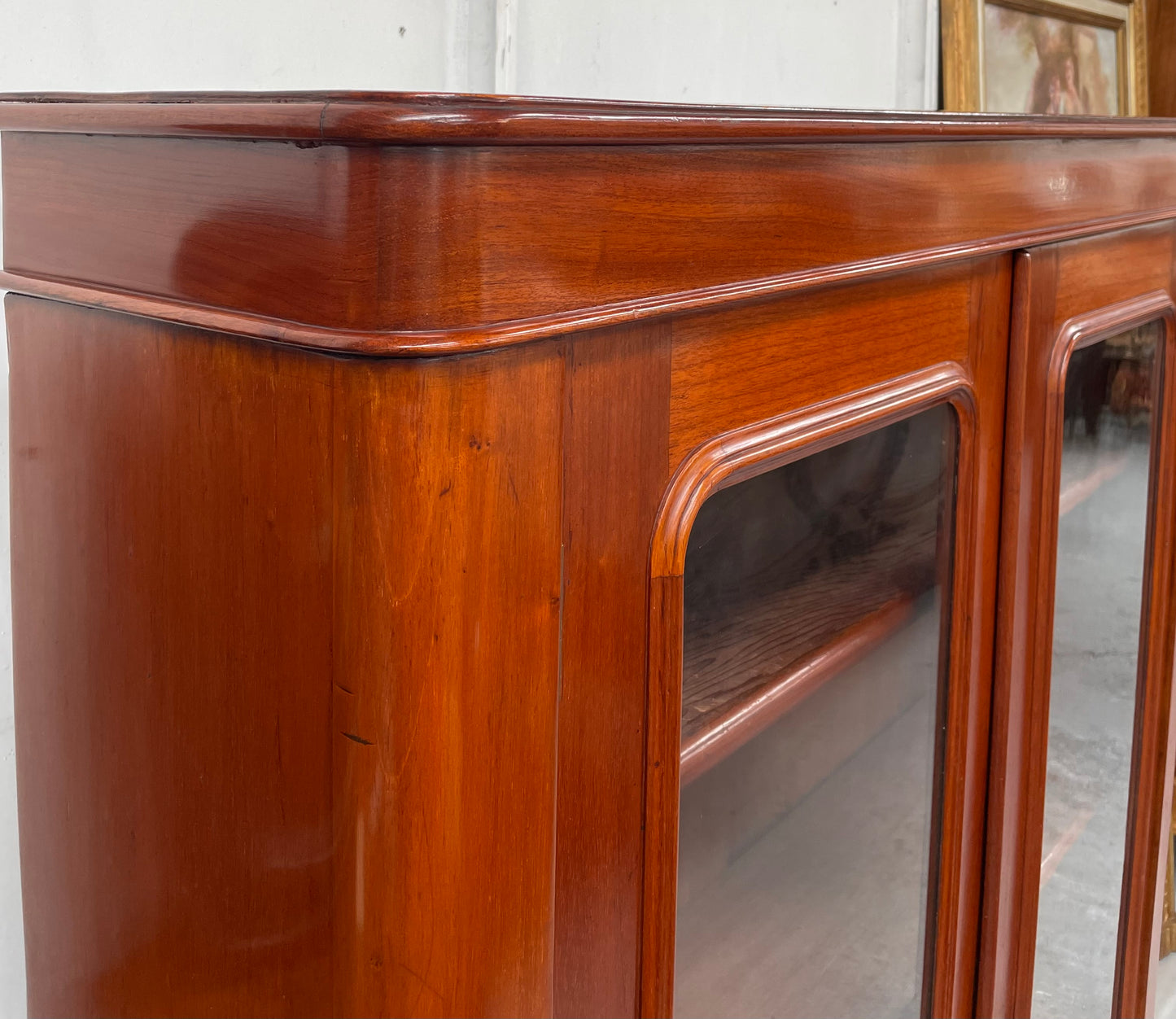 Practical late Victorian Cedar two door bookcase on cabriole feet and adjustable shelves. In good condition. Please see photos as they form part of the description. Circa: 1890's