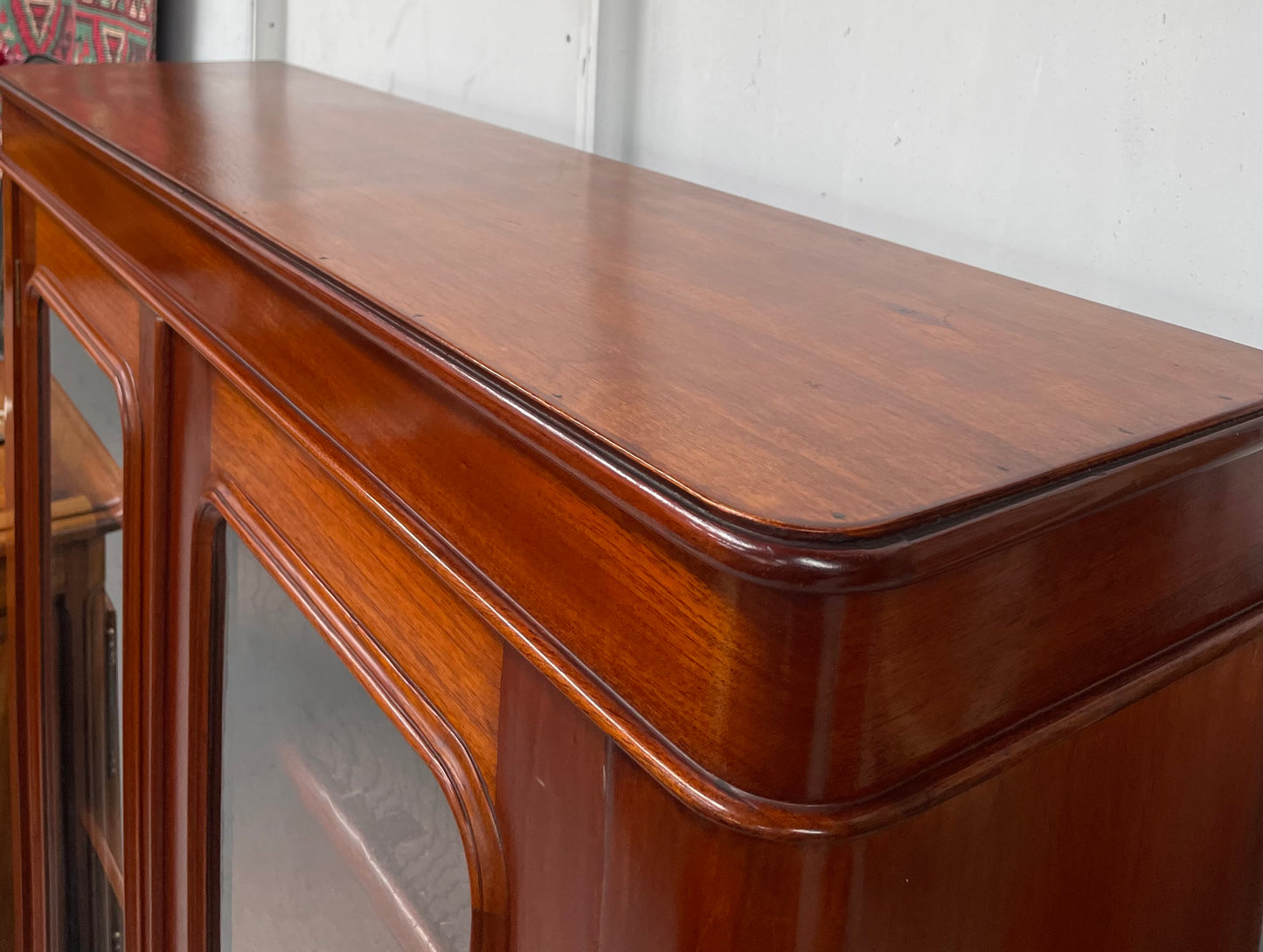 Practical late Victorian Cedar two door bookcase on cabriole feet and adjustable shelves. In good condition. Please see photos as they form part of the description. Circa: 1890's