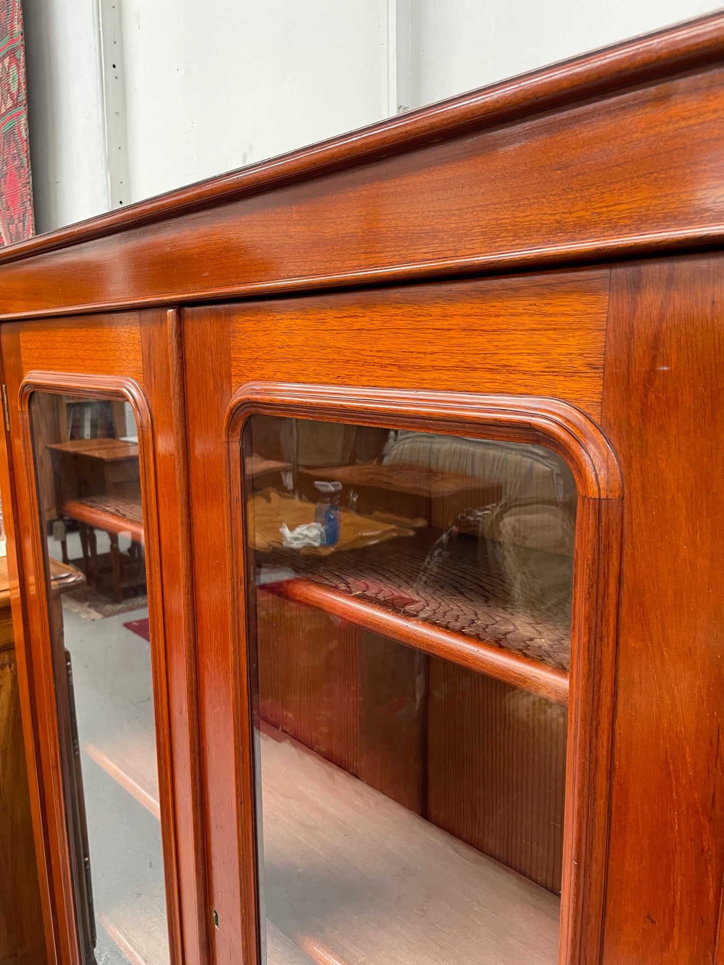 Practical late Victorian Cedar two door bookcase on cabriole feet and adjustable shelves. In good condition. Please see photos as they form part of the description. Circa: 1890's