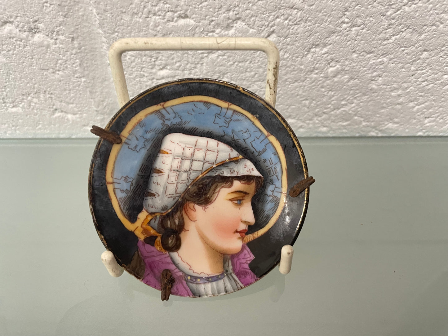 Antique miniature hand painted dish of a woman in profile. In good original condition. Please see photos as they form part of the description.