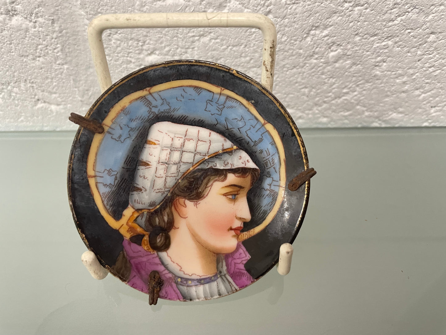 Antique miniature hand painted dish of a woman in profile. In good original condition. Please see photos as they form part of the description.