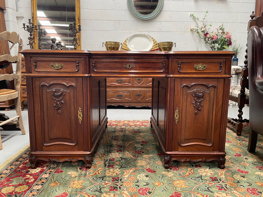 Fabulous French Walnut Louis XV style partners desk with a parquetry top and plenty of storage space. In good original detailed condition and has be