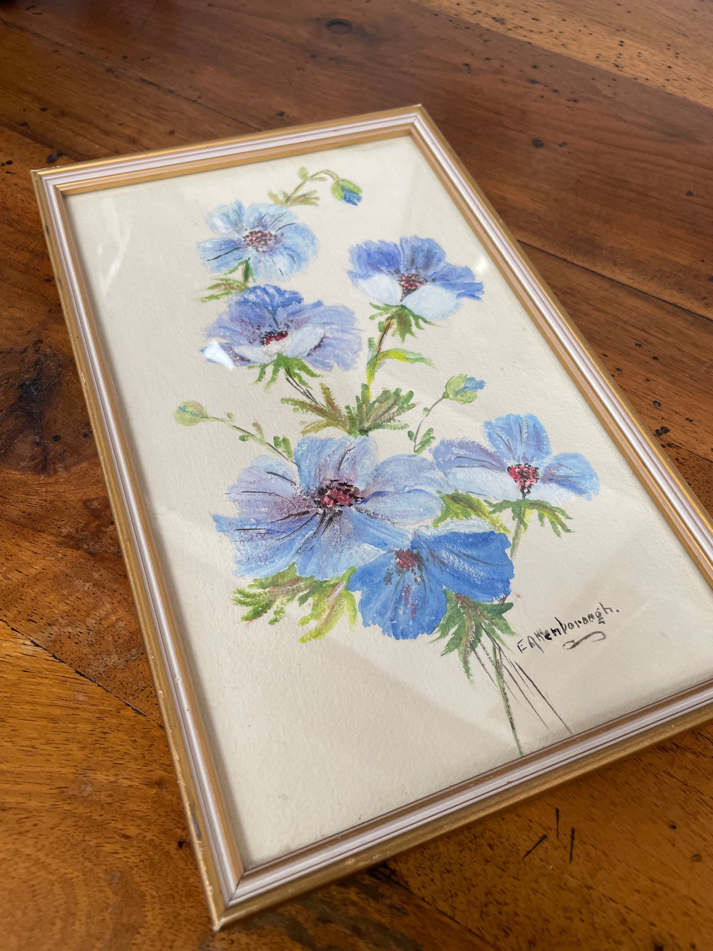 Charming framed and signed floral watercolor. Sourced locally and in good original condition.