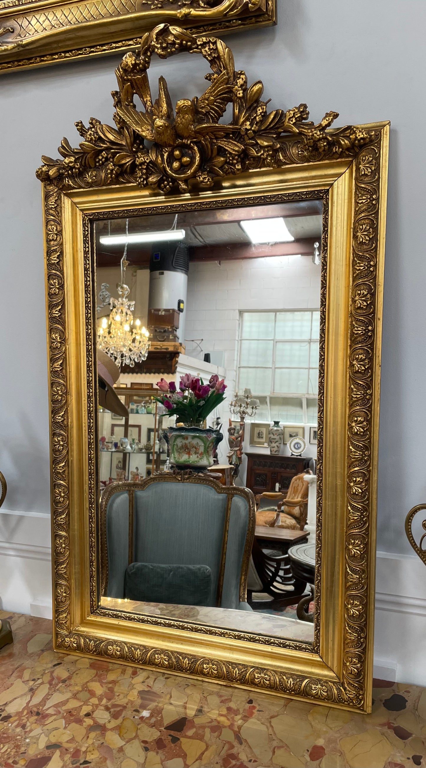 Compact Late 19th Century French Gilt Framed Wall Mirror Featuring Carved Birds