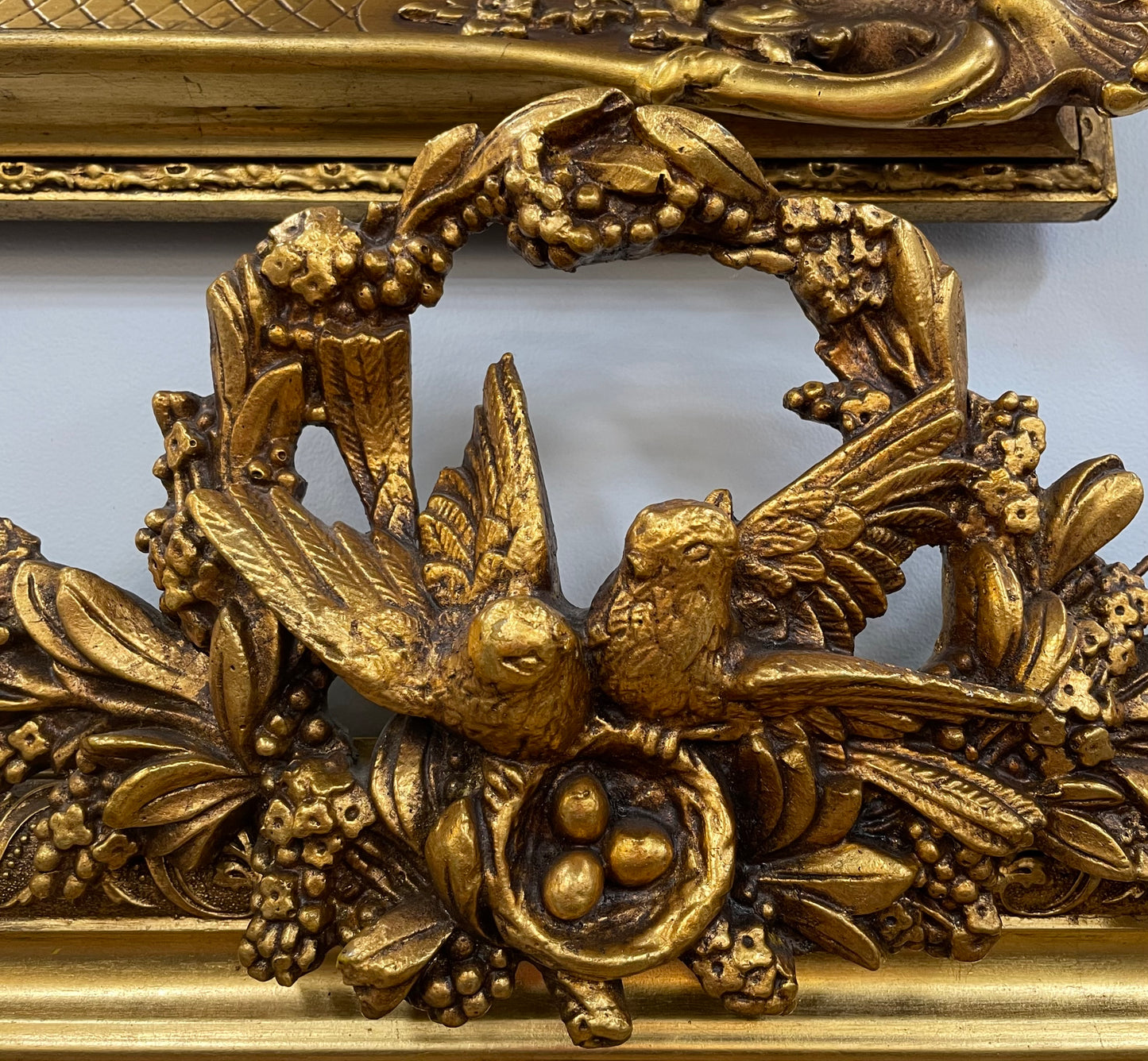 Compact Late 19th Century French Gilt Framed Wall Mirror Featuring Carved Birds