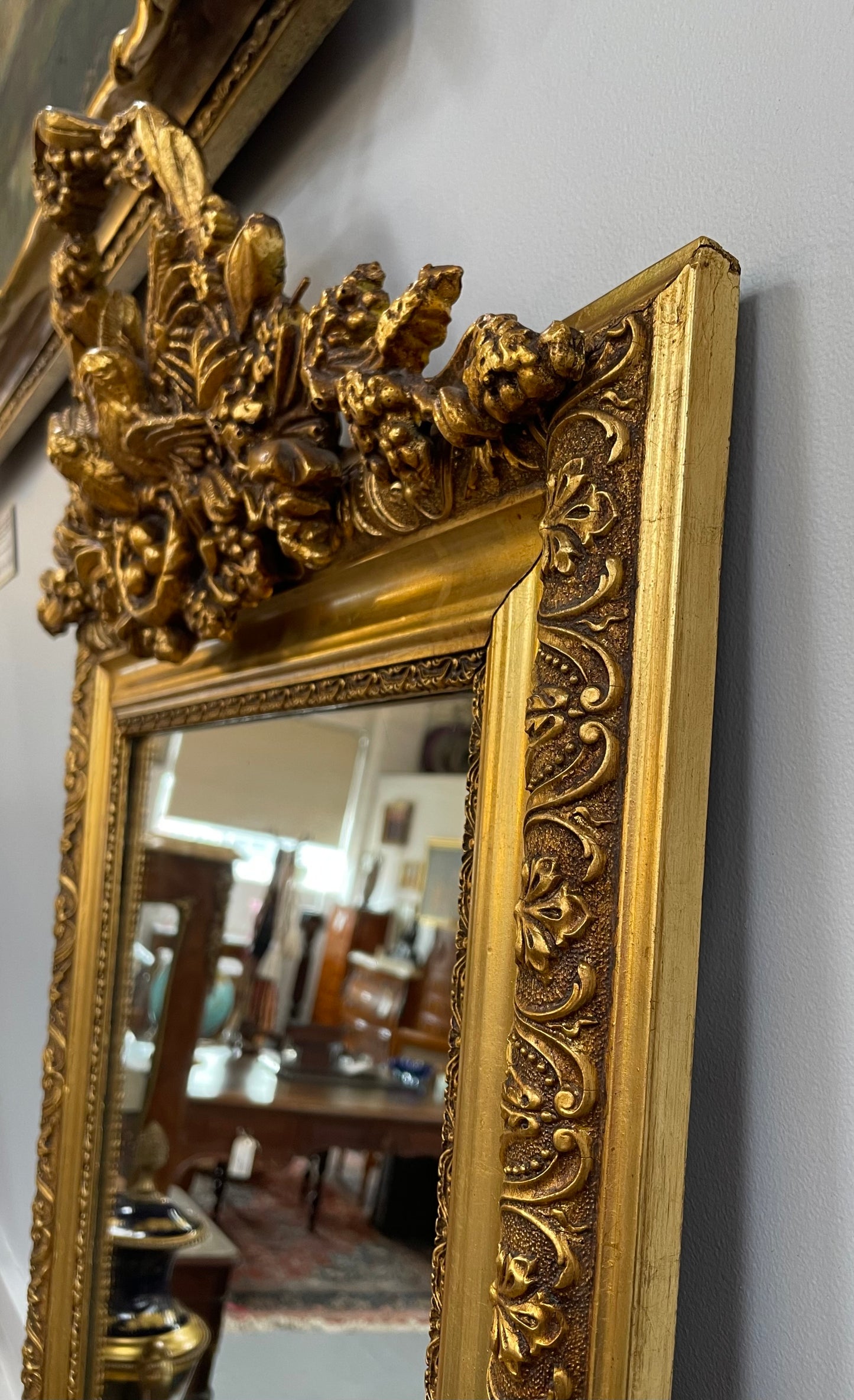 Compact Late 19th Century French Gilt Framed Wall Mirror Featuring Carved Birds