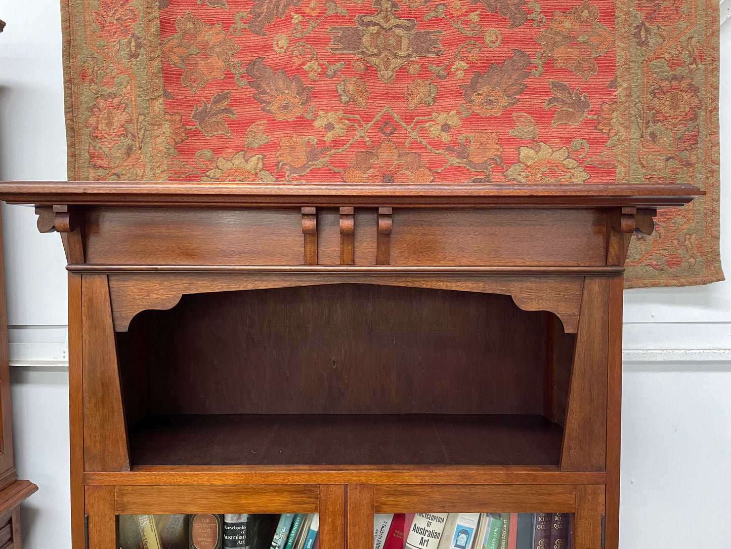 Practical Arts and Crafts <span data-mce-fragment="1"> bookcase featuring two glass doors and three fixed shelves. Perfect for organizing your books or showcasing your favorite pieces, this bookcase also includes a top shelf for additional display space. I</span>t has been sourced locally and is in good original condition.