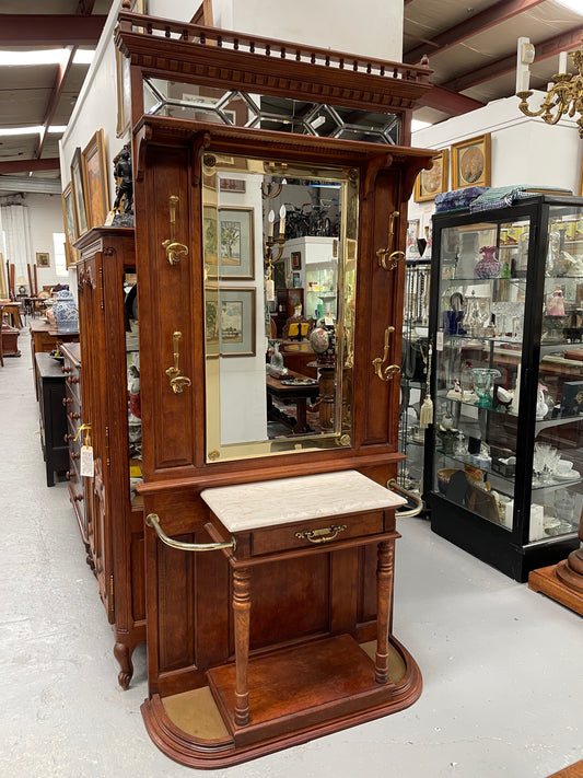 Outstanding quality custom made vintage French style hallstand. It features four decorative hanging hooks, a practical white marble top and a drawer for added storage. In good original condition and has been sourced locally.