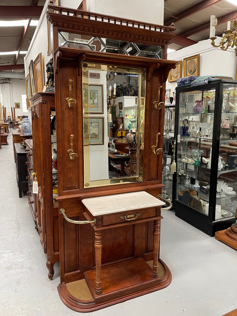 Outstanding quality custom made vintage French style hallstand. It features four decorative hanging hooks, a practical white marble top and a drawer for added storage. In good original condition and has been sourced locally.