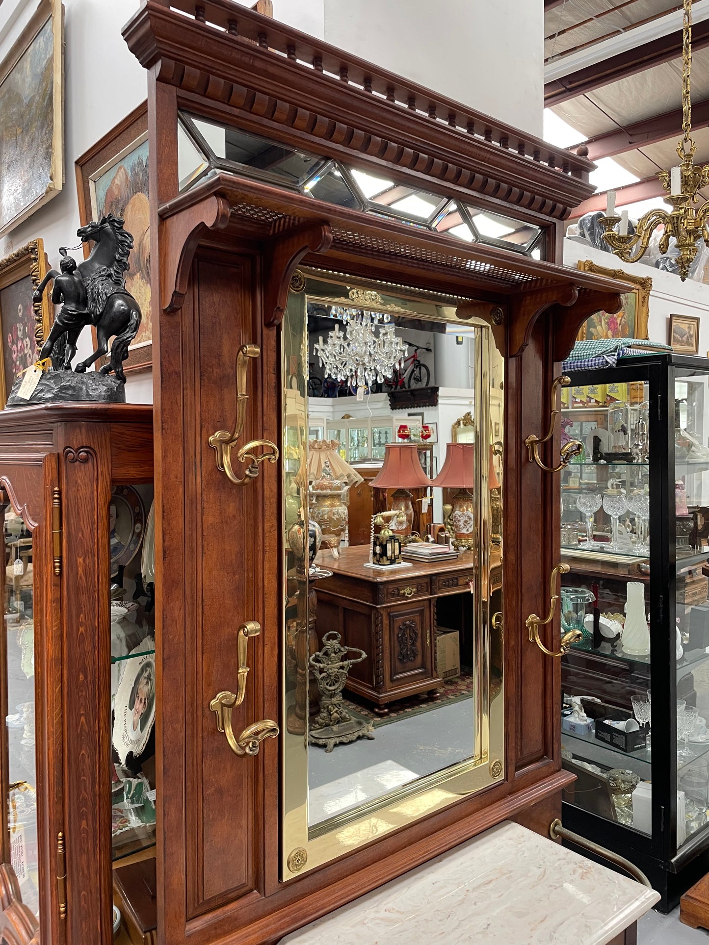 Outstanding quality custom made vintage French style hallstand. It features four decorative hanging hooks, a practical white marble top and a drawer for added storage. In good original condition and has been sourced locally.