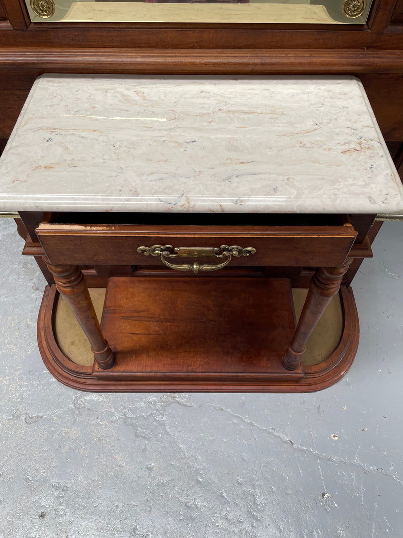 Outstanding quality custom made vintage French style hallstand. It features four decorative hanging hooks, a practical white marble top and a drawer for added storage. In good original condition and has been sourced locally.