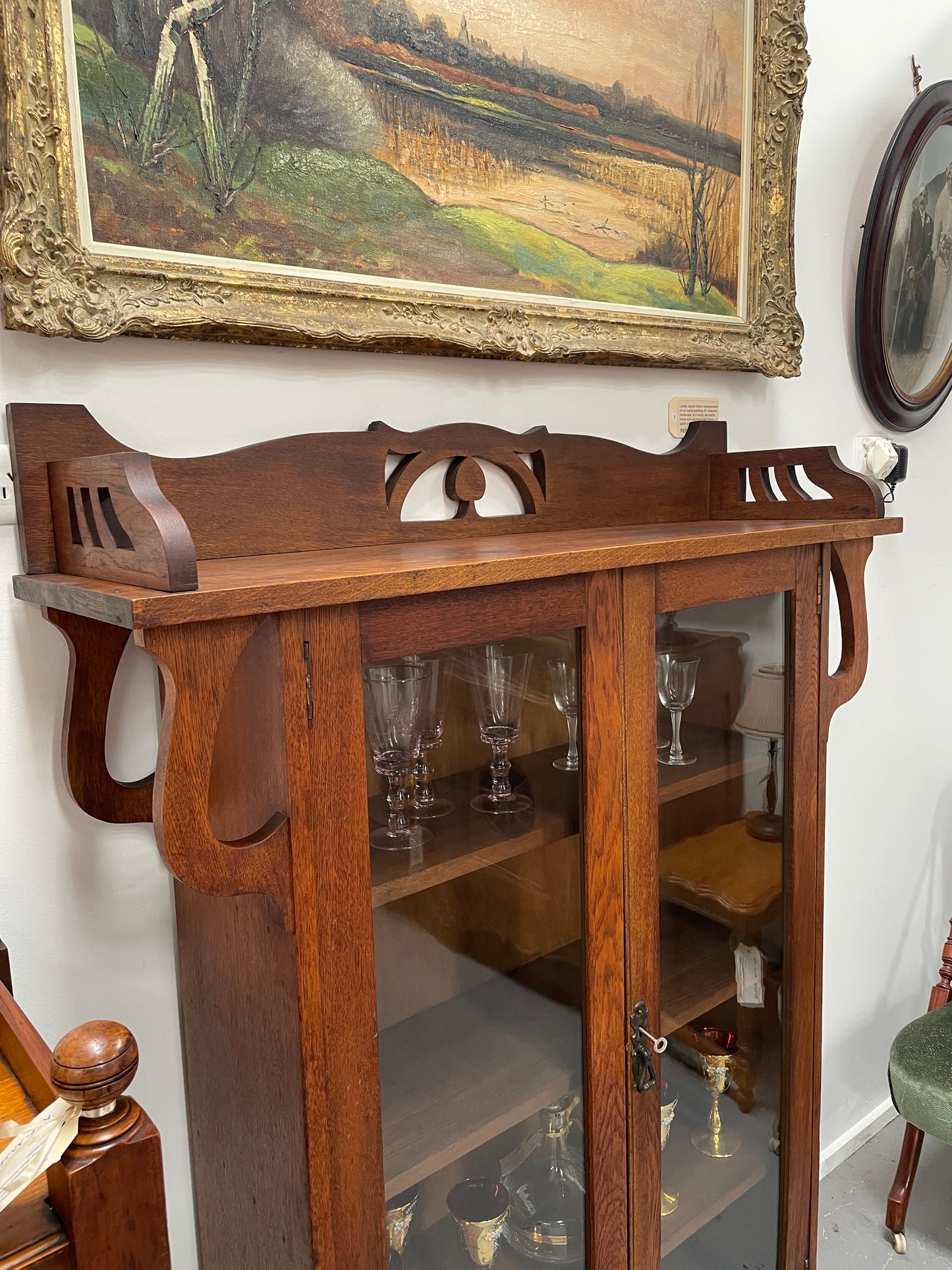 Art Nouveau solid Oak bookcase with three fixed shelves. Could also be used as a display cabinet. Sourced locally and in good original condition.