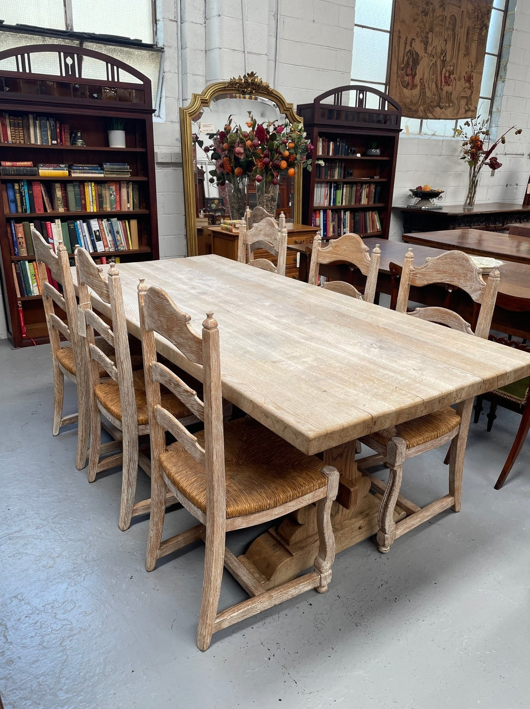 Sourced from France a raw French Oak pedestal dining table. This stunning table features raw oak timber that could be used as is for a distressed look, or finished and waxed for a more refined look. It is in good solid original condition.