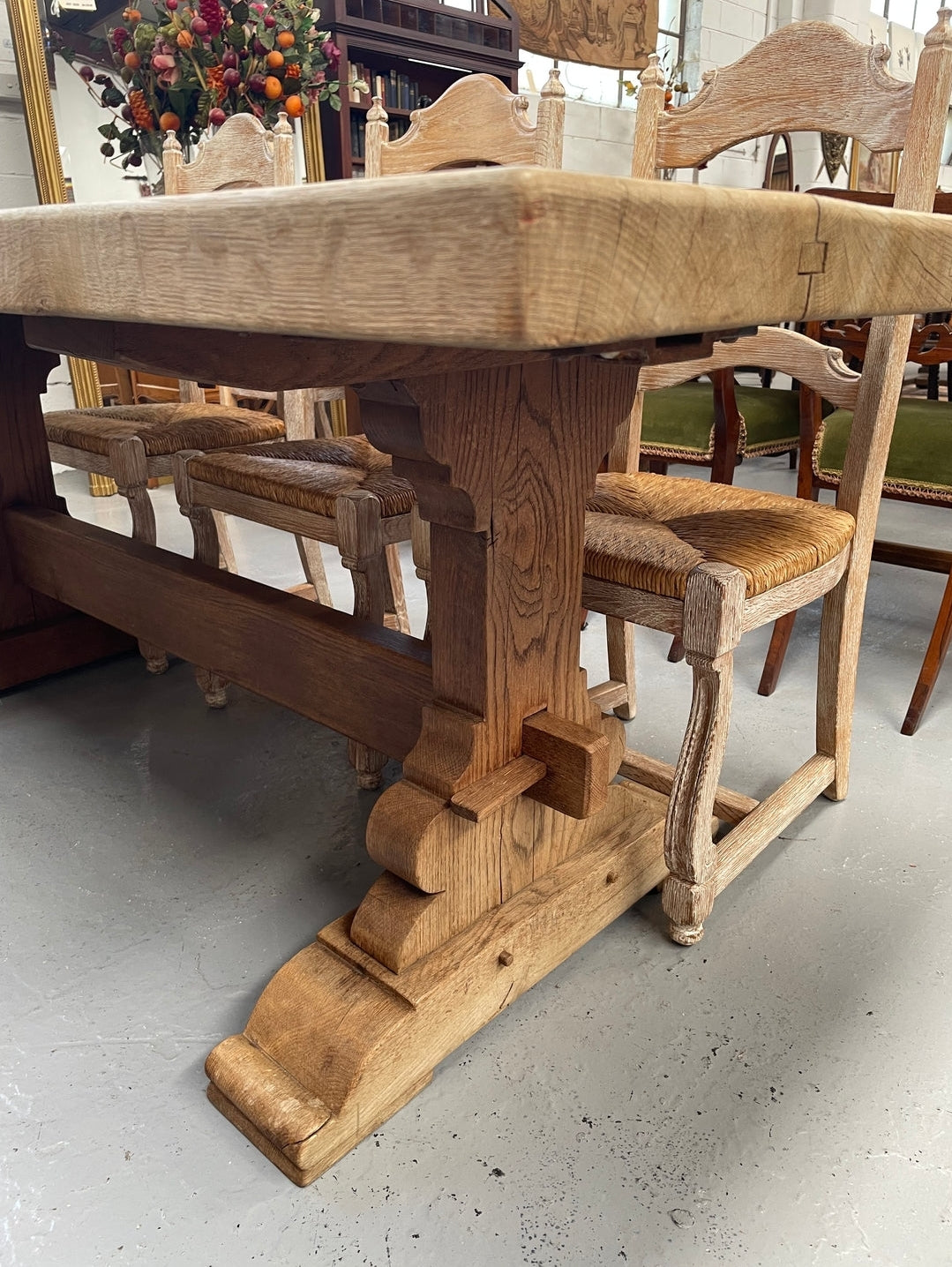 Sourced from France a raw French Oak pedestal dining table. This stunning table features raw oak timber that could be used as is for a distressed look, or finished and waxed for a more refined look. It is in good solid original condition.