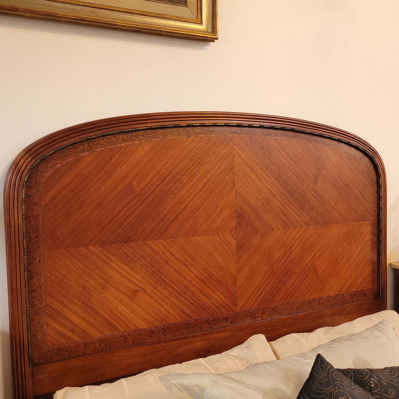French Art Deco Walnut queen size bed with bronze mounts. Bed comes complete with custom made slats. Just place your mattress on top. Sourced from France and in good original detailed condition.