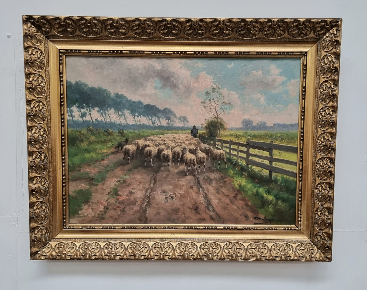 Sourced in France is this beautiful  oil painting on canvas of sheep on  a country farm and framed in a ornate gilt frame. In good original condition.