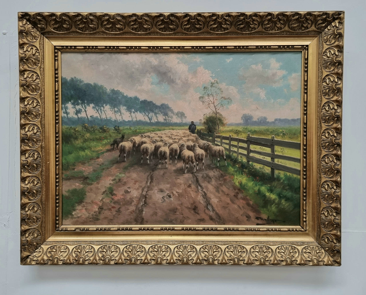 Sourced in France is this beautiful  oil painting on canvas of sheep on  a country farm and framed in a ornate gilt frame. In good original condition.