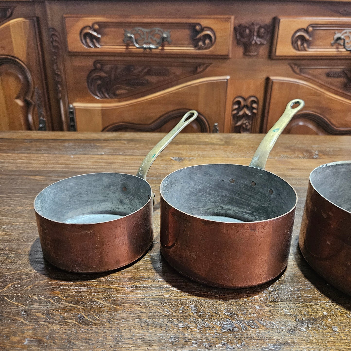Lovely set of five copper sauce pots, they are all in good original condition for the age. Sourced from France.