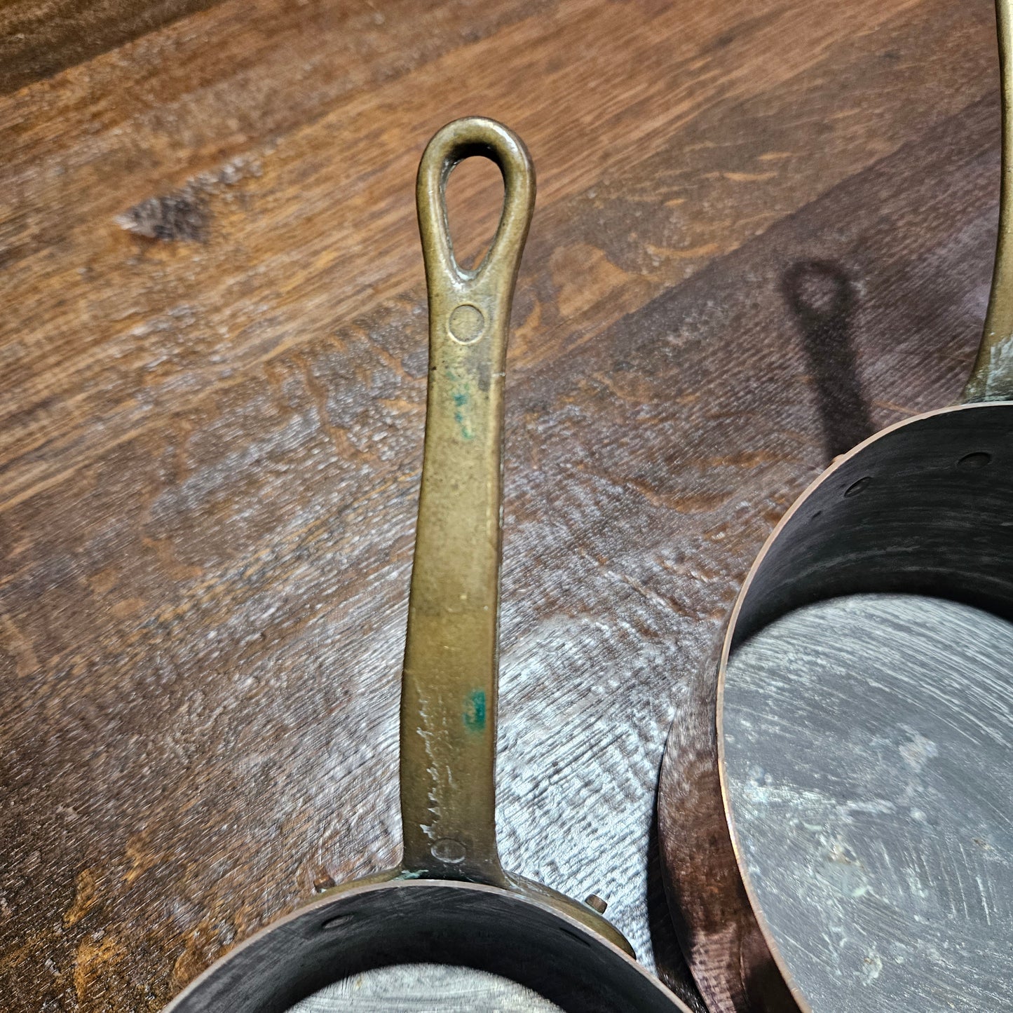 Lovely set of five copper sauce pots, they are all in good original condition for the age. Sourced from France.