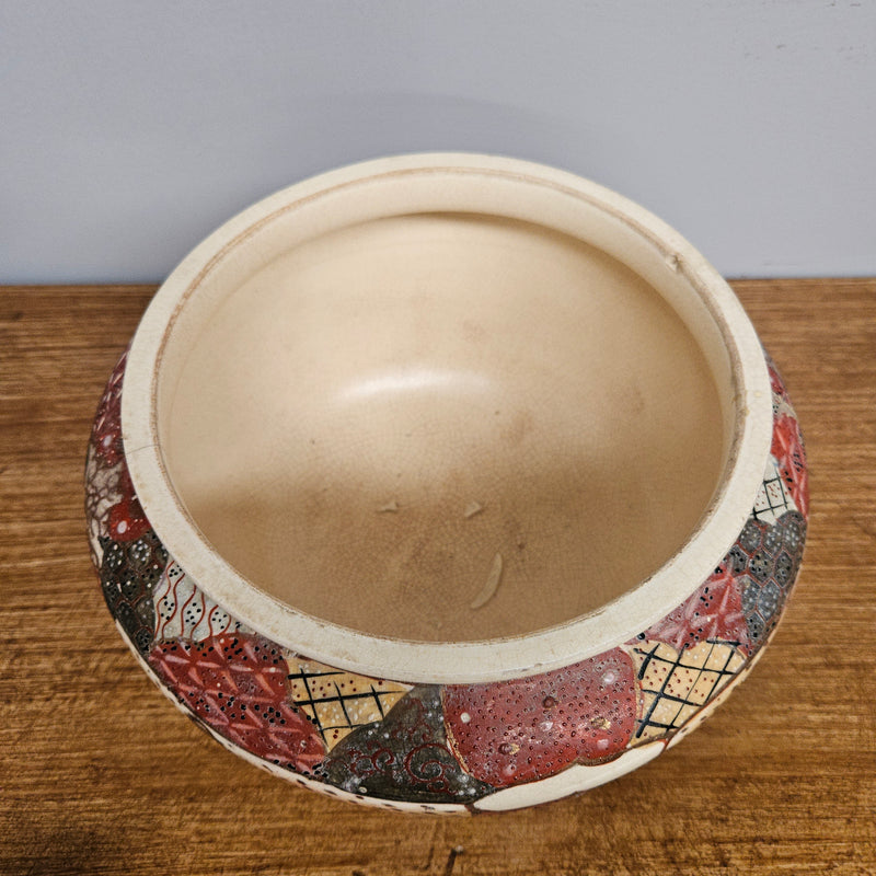 Antique Satsuma hand painted jardinière pot. It is signed and has some crazing. In good condition.