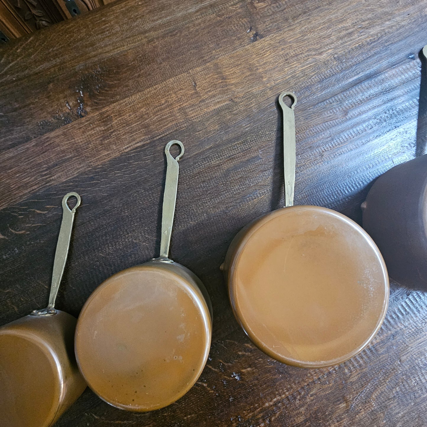 Amazing set of five sauce pots with spouts, lovely handles. They are in good original condition and have been sourced from France
