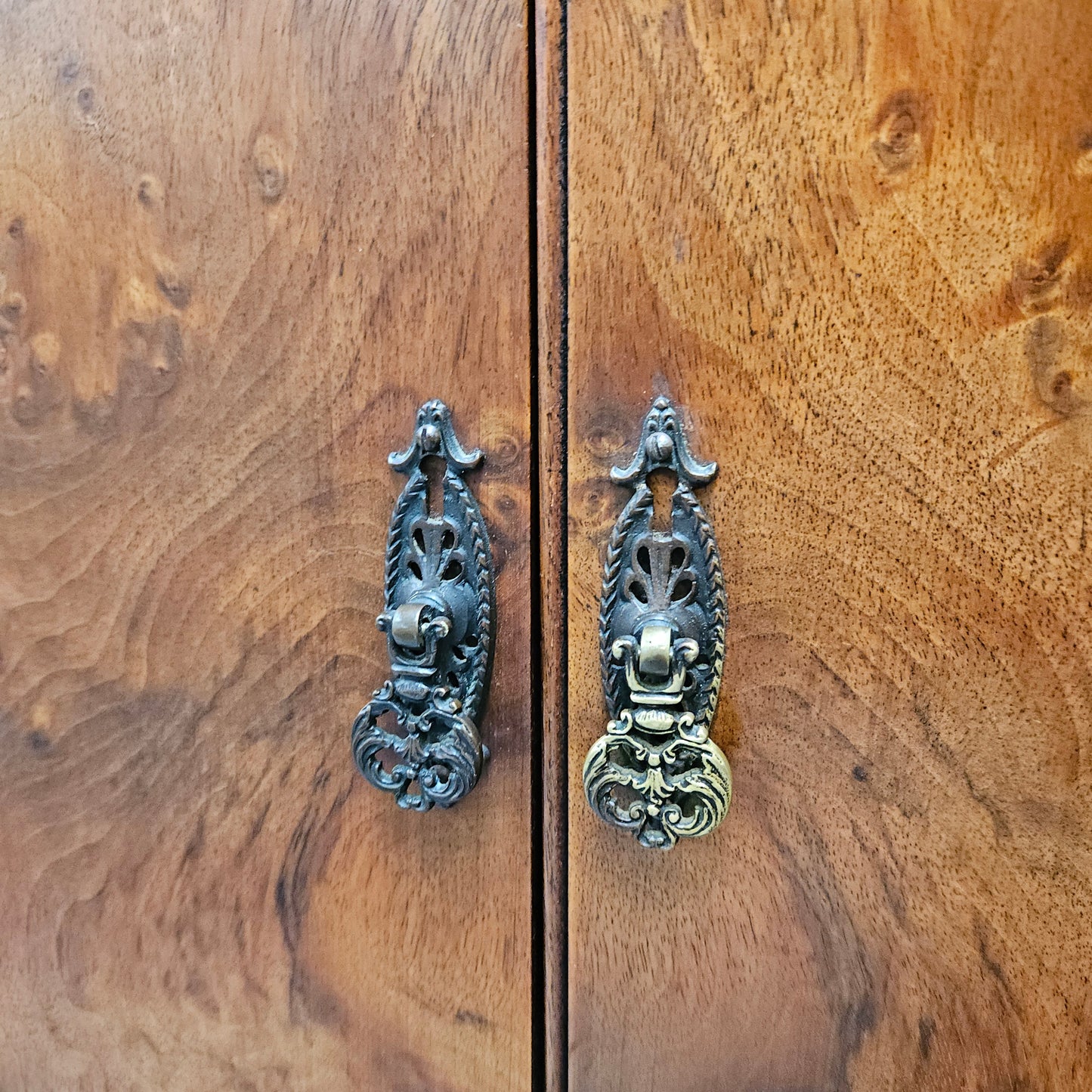 Lovely figured walnut Antique cabinet with a two door cabinet and two drawers. Circa 1930s. This cabinet can be used as a regular cabinet, drinks cabinet or tv unit as it has the hole for cables at the back. It is in good original detailed condition.