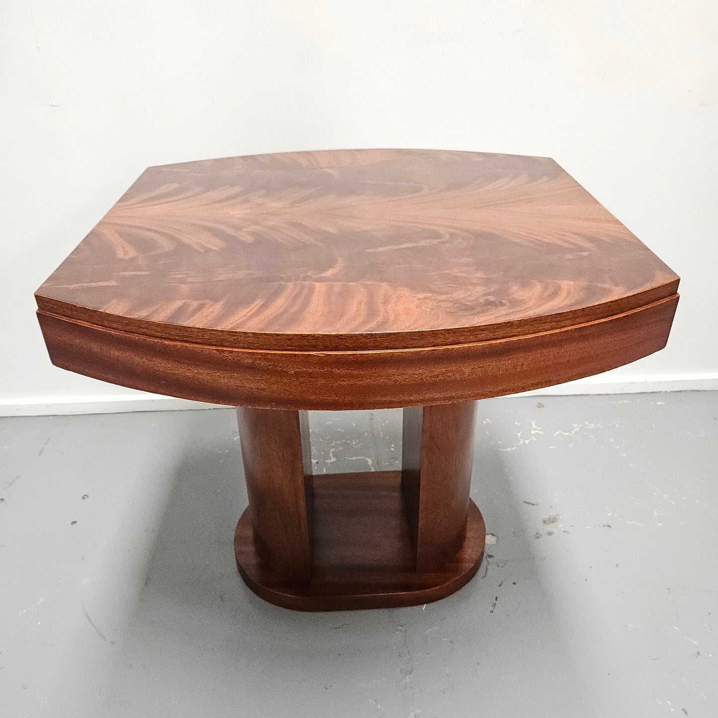 French Art Deco flame mahogany center table. Sourced directly from France it is in good original detailed condition. Circa 1930's