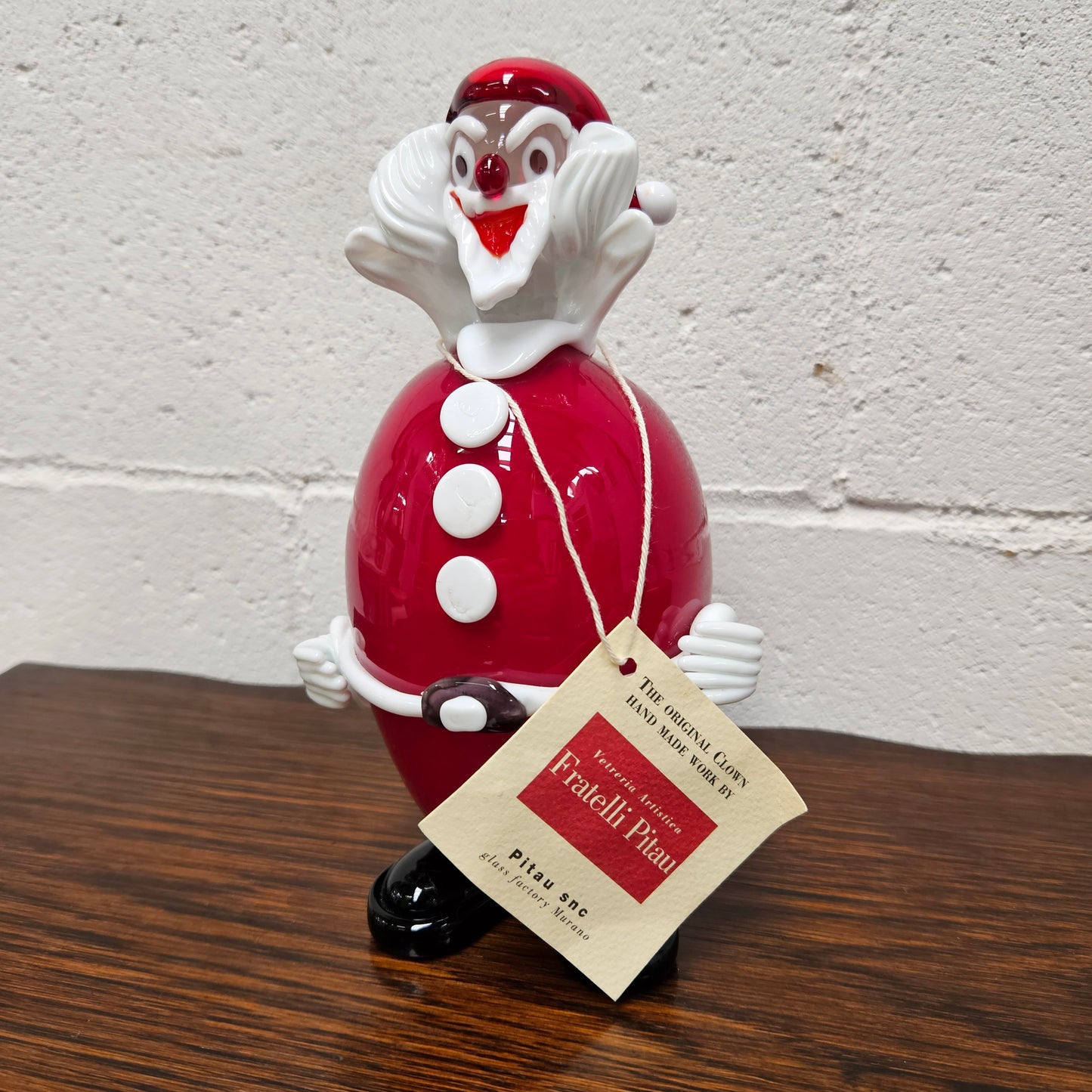 Very rare Murano Glass Christmas clown By Fratelli Pitau. It still has its original sticker and tag. It is in good original condition with no chips or cracks.
