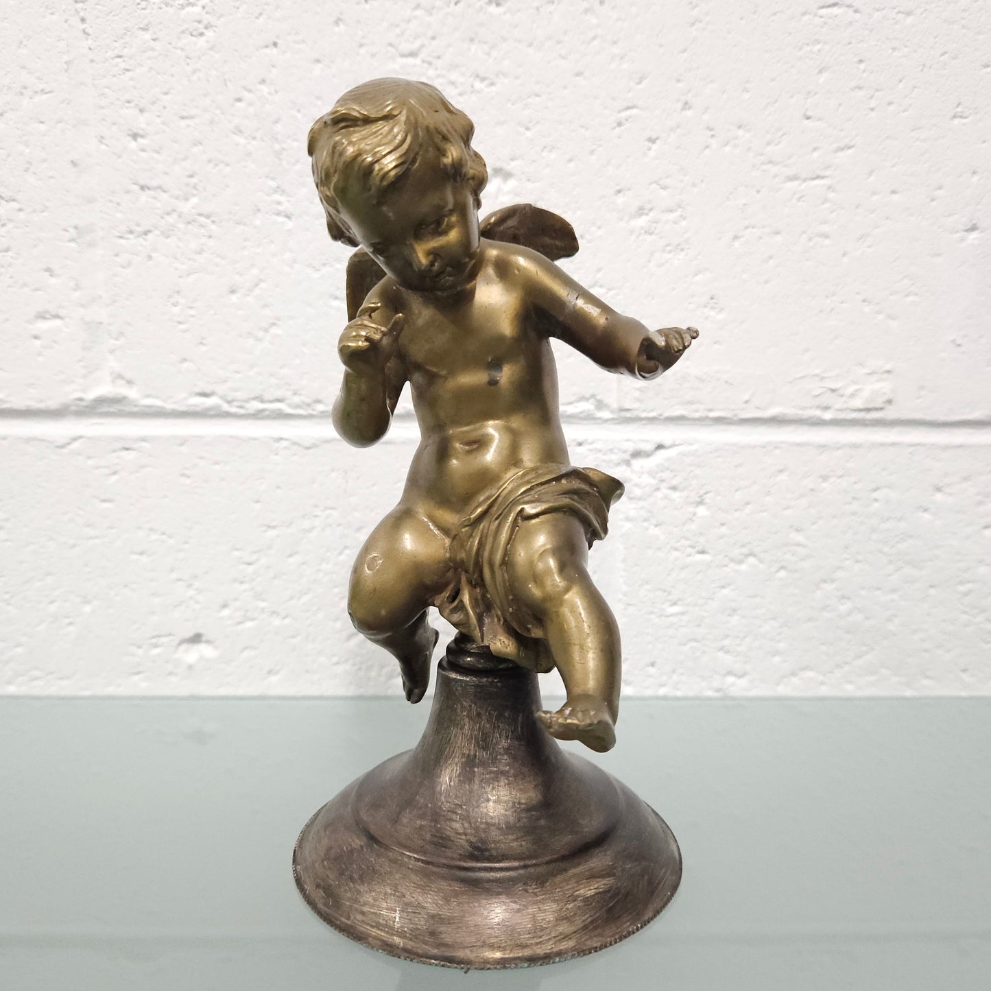 Attractive bronze winged cherub Circa: 1900. In good original condition.
