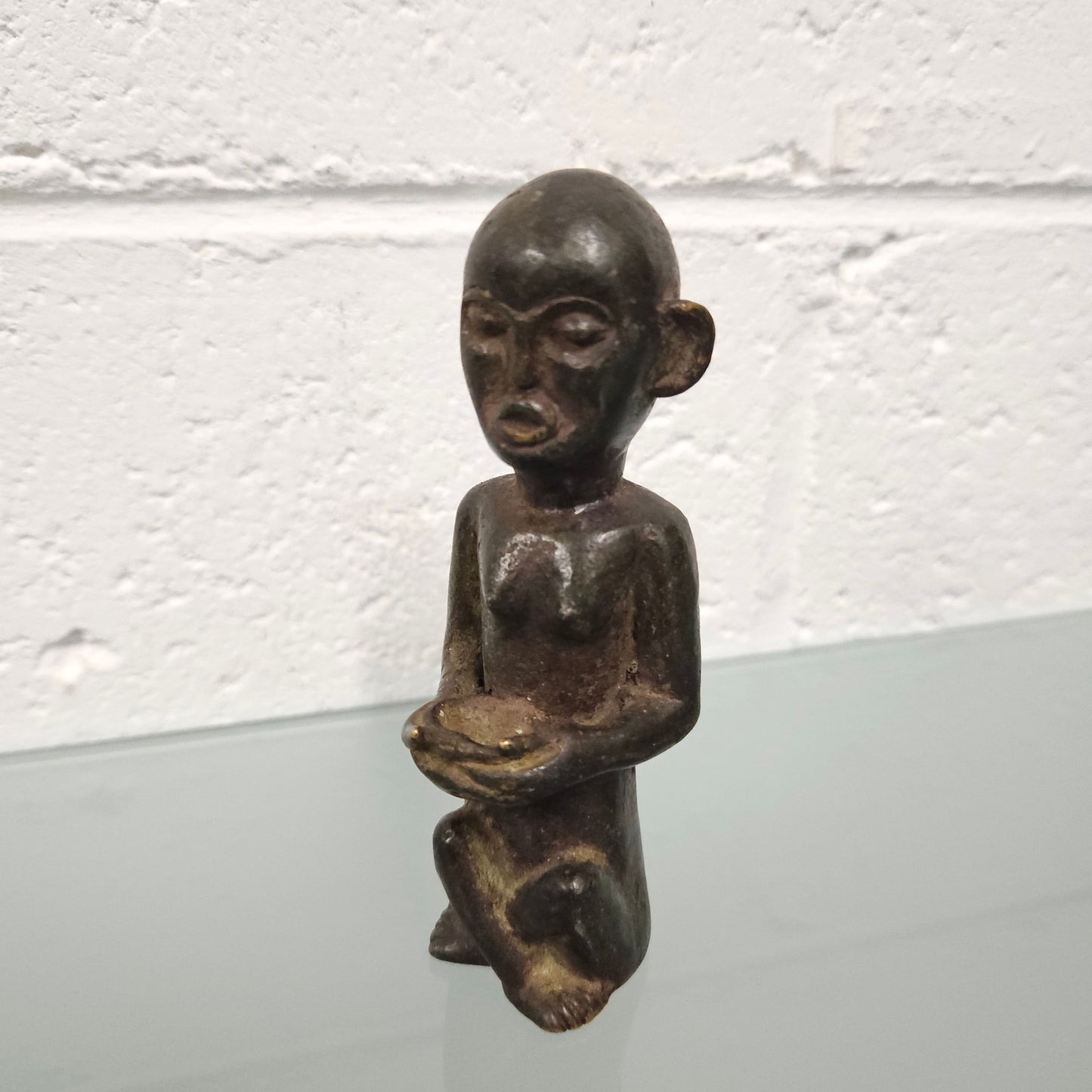 Unusual antique African bronze native figure. In good original condition.