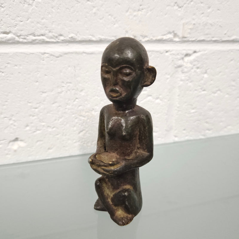 Unusual antique African bronze native figure. In good original condition.