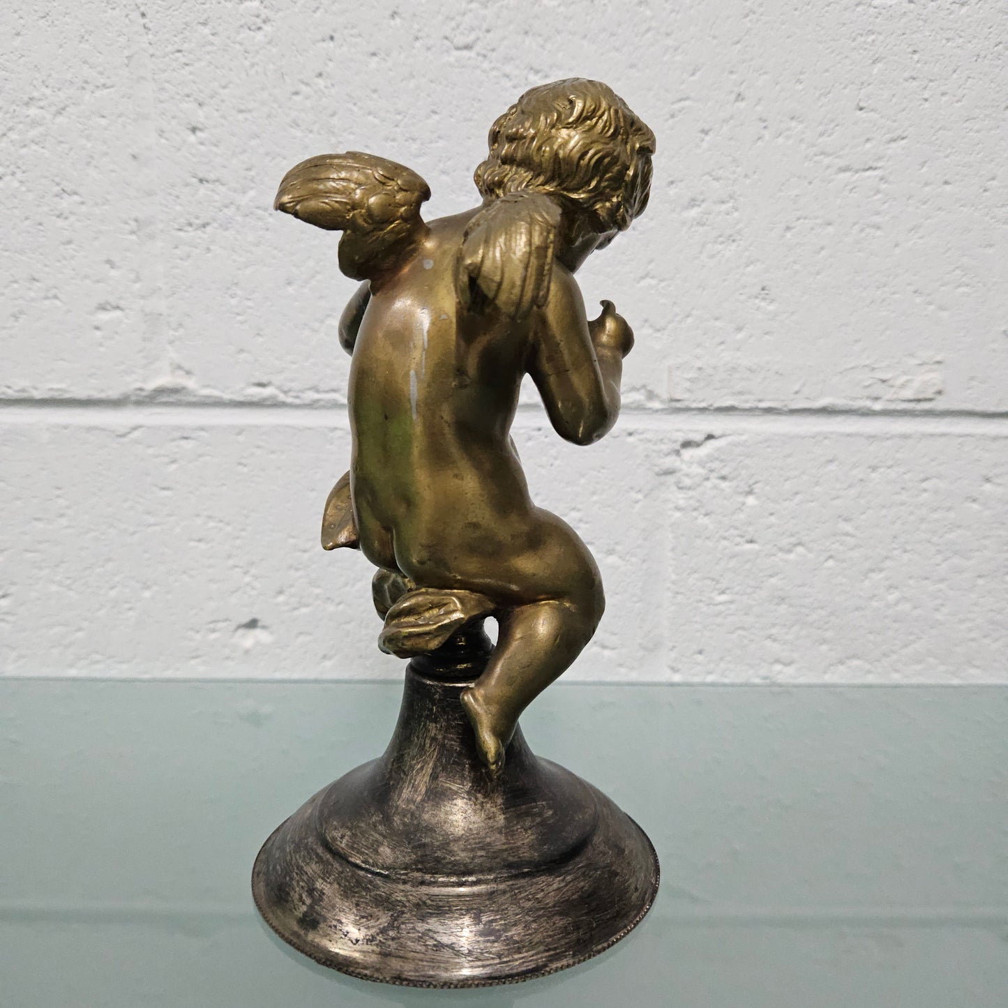 Attractive bronze winged cherub Circa: 1900. In good original condition.