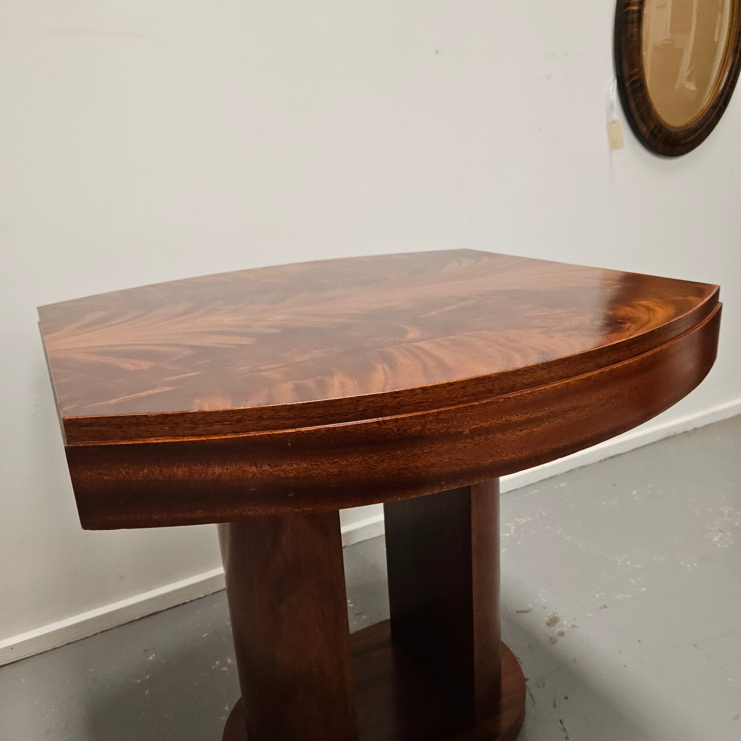 French Art Deco flame mahogany center table. Sourced directly from France it is in good original detailed condition. Circa 1930's