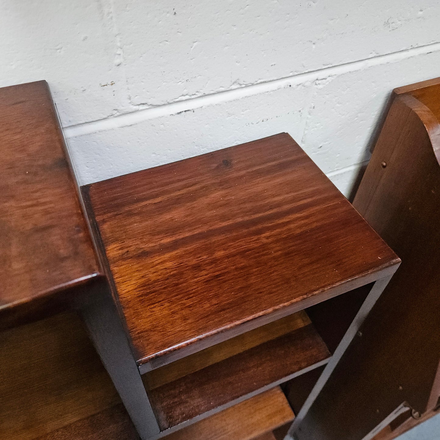 Australian blackwood Arts and Crafts bookcase with two fully adjustable shelves. It has been sourced locally. Made with solid Australian blackwood, this Arts and Crafts bookcase boasts two fully adjustable shelves for versatile storage options. Its good original detail adds a touch of character and charm.