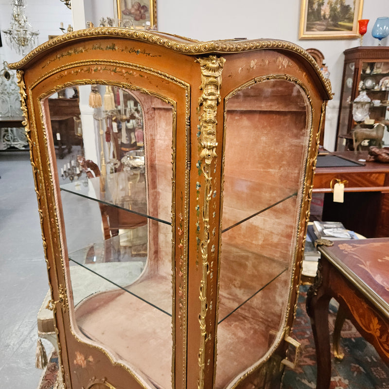 Stunning Rare 19th Century French Salon style vitrine/display cabinet. It has beautifully hand-painted panels and decoration all over with the original two glass shelves inside. It is circa 1900. In very good restored condition.