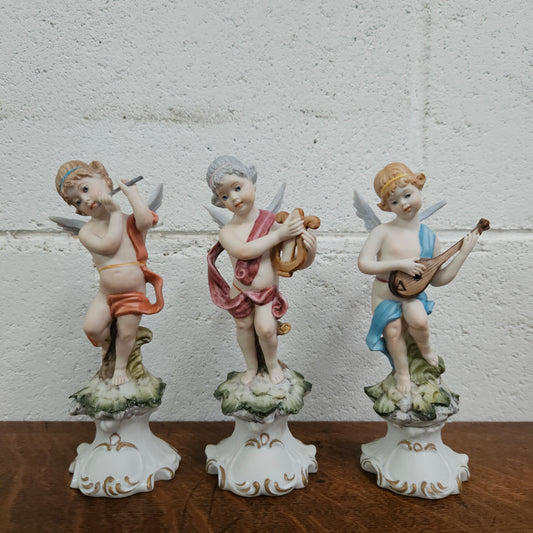 Set of Three Capodimonte Angle Figurines