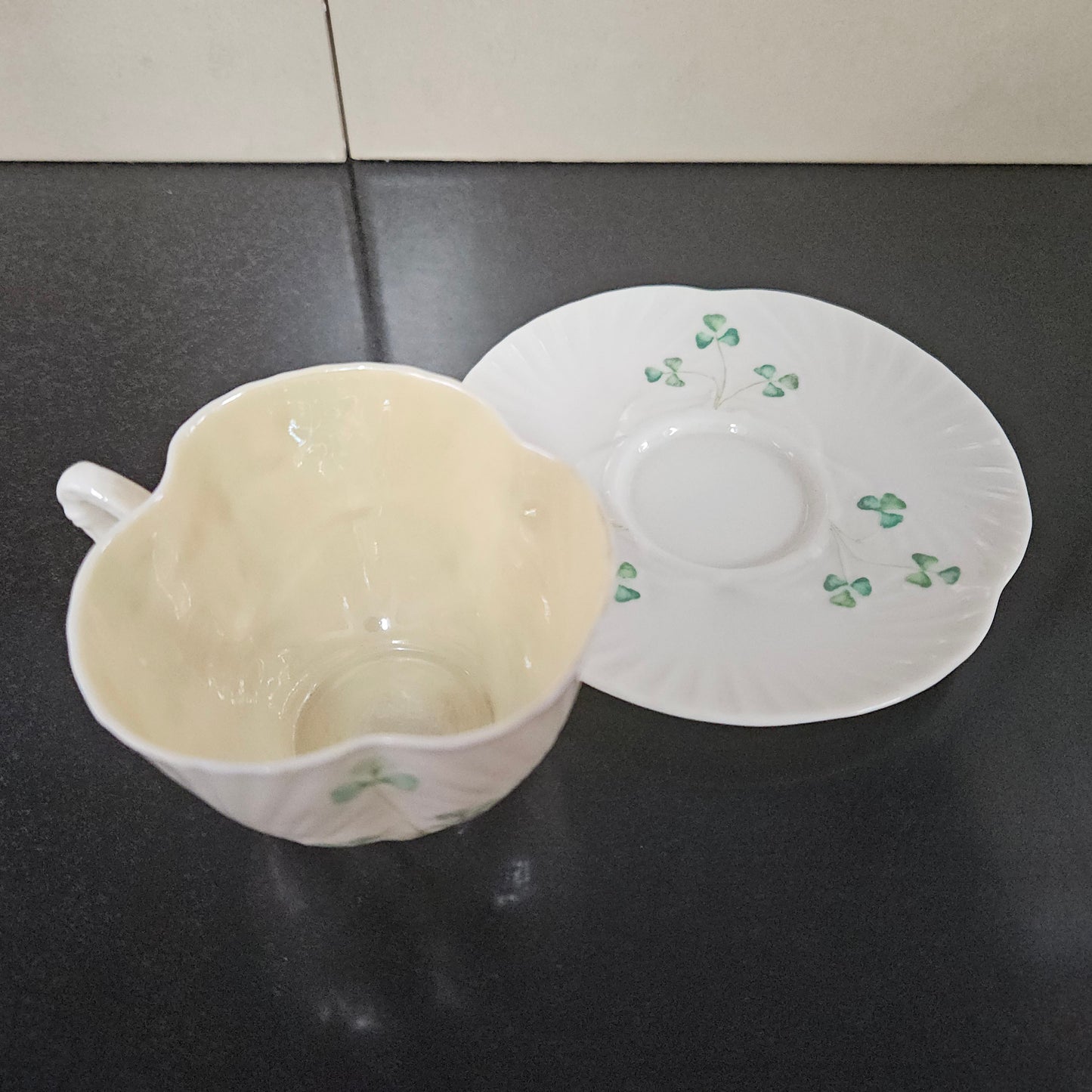 Belleek Coffee Cup and Saucer In Shell Pattern