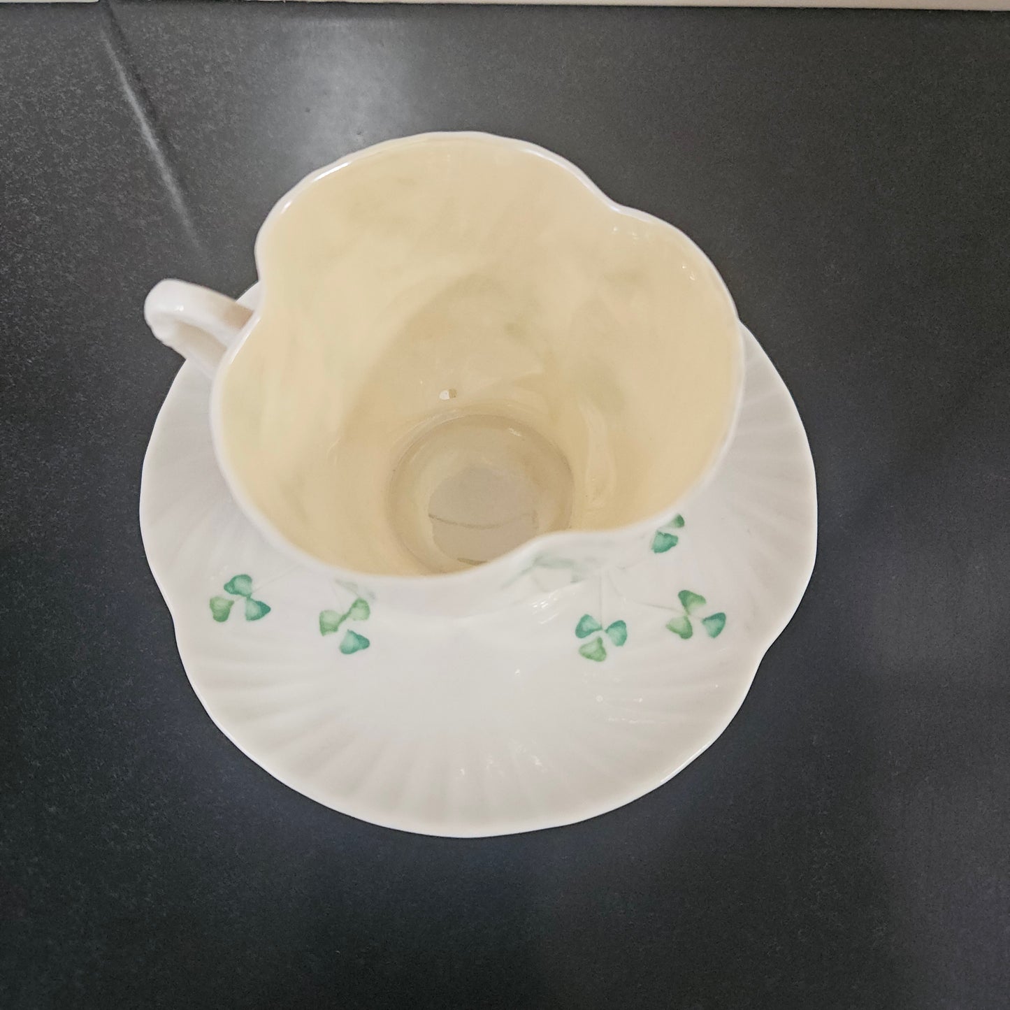 Belleek Coffee Cup and Saucer In Shell Pattern