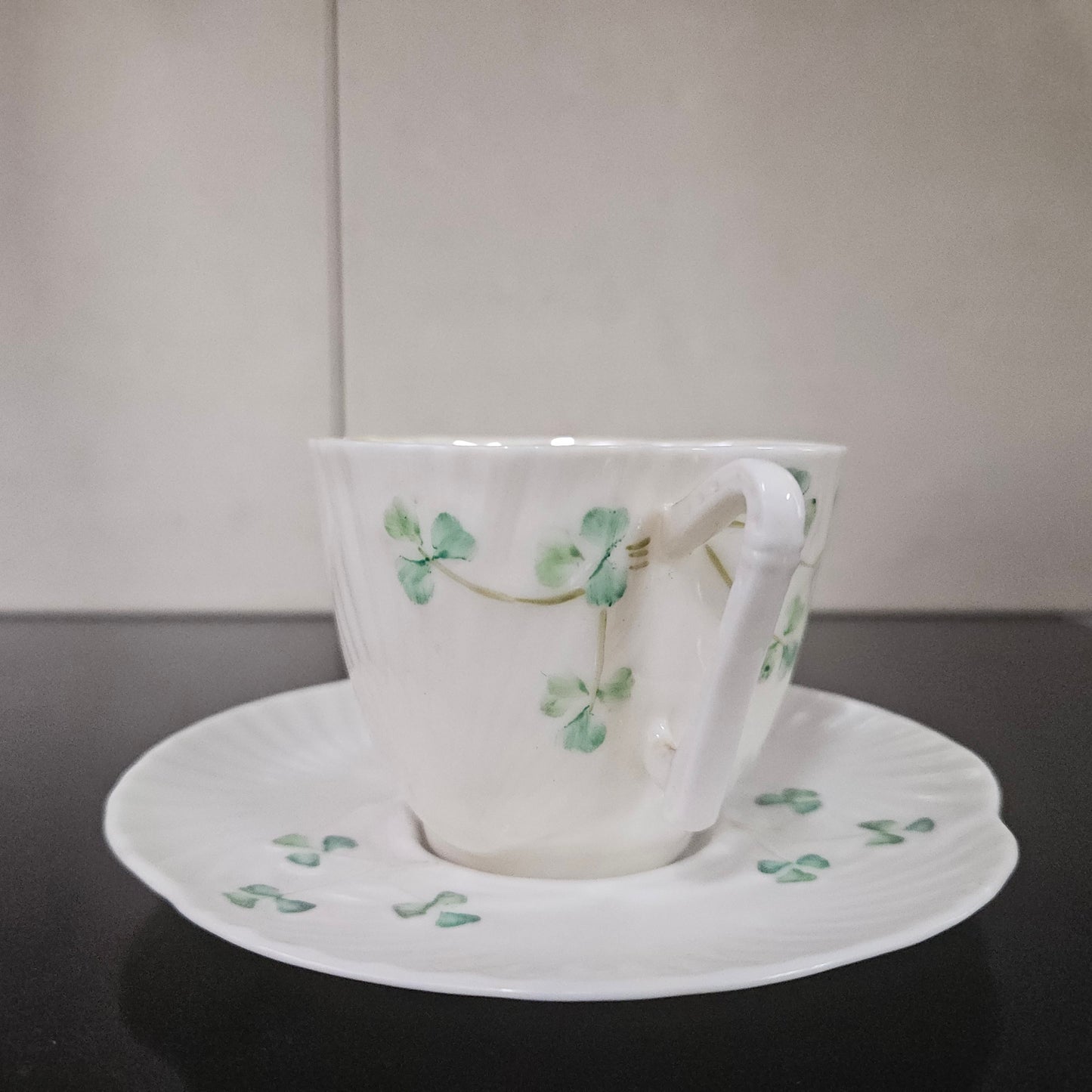 Belleek Coffee Cup and Saucer In Shell Pattern