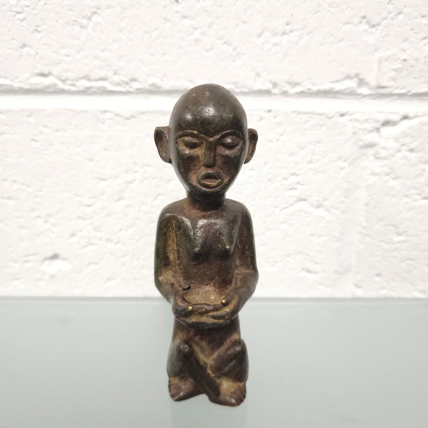 Unusual antique African bronze native figure. In good original condition.