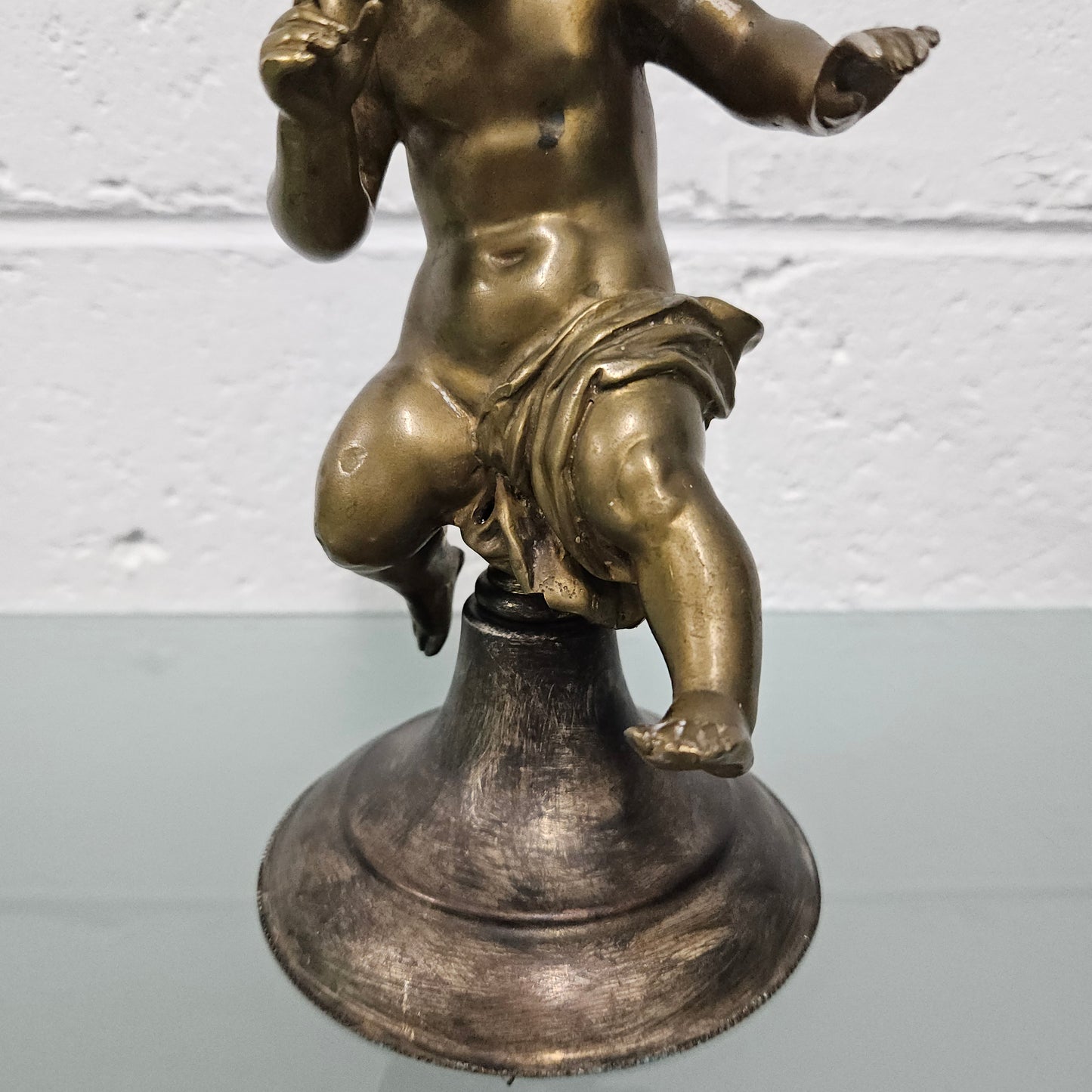 Attractive bronze winged cherub Circa: 1900. In good original condition.