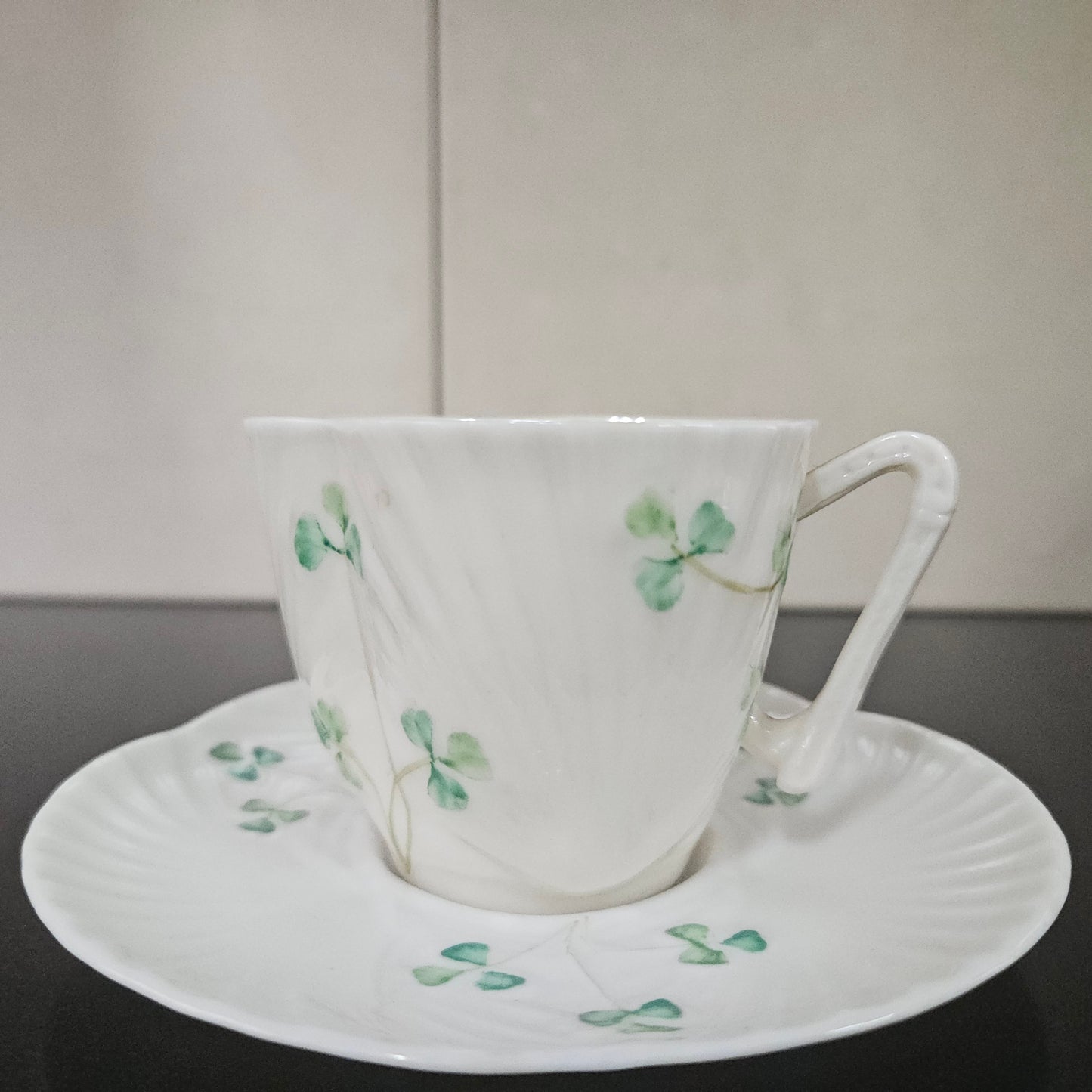 Belleek Coffee Cup and Saucer In Shell Pattern