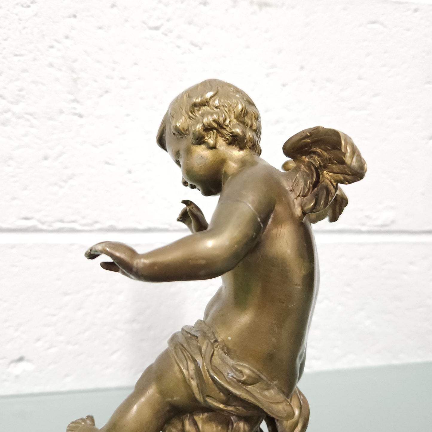 Attractive bronze winged cherub Circa: 1900. In good original condition.