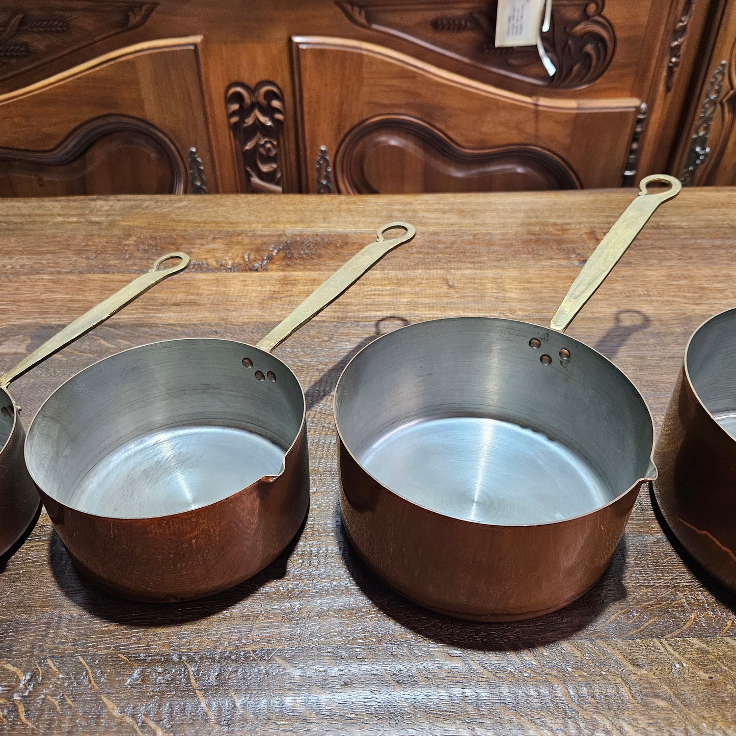 Amazing set of five sauce pots with spouts, lovely handles. They are in good original condition and have been sourced from France