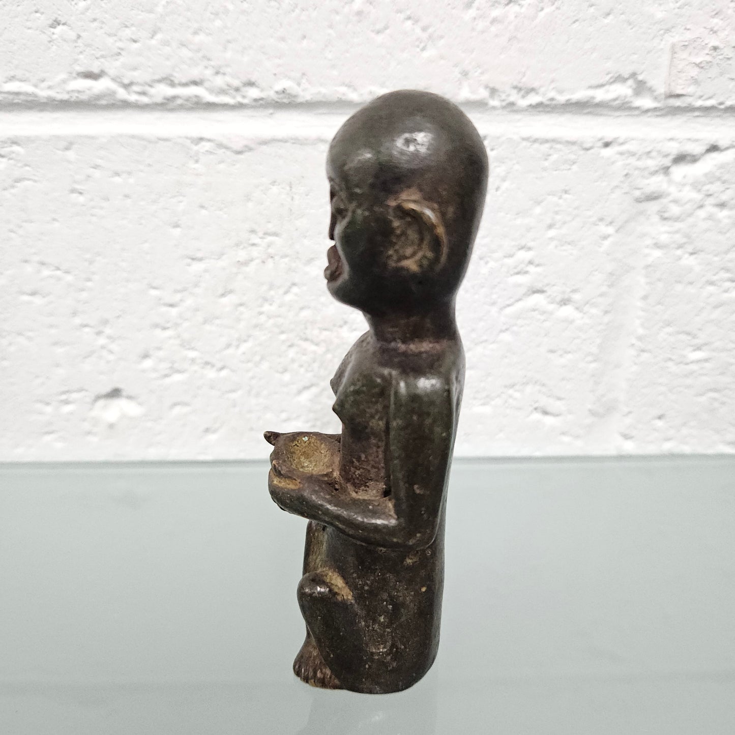 Unusual antique African bronze native figure. In good original condition.