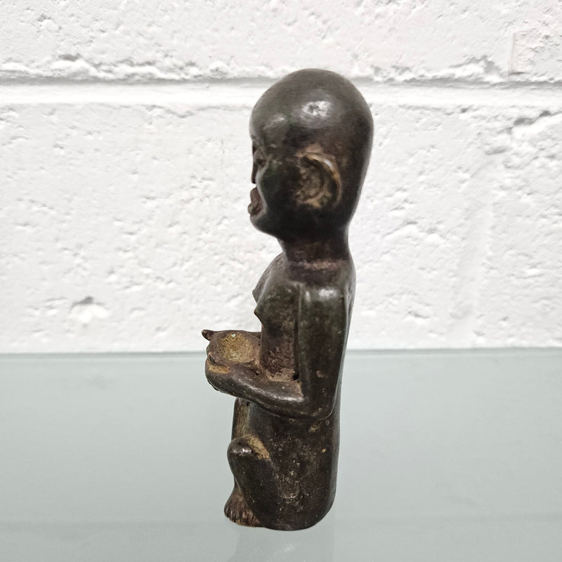 Unusual antique African bronze native figure. In good original condition.