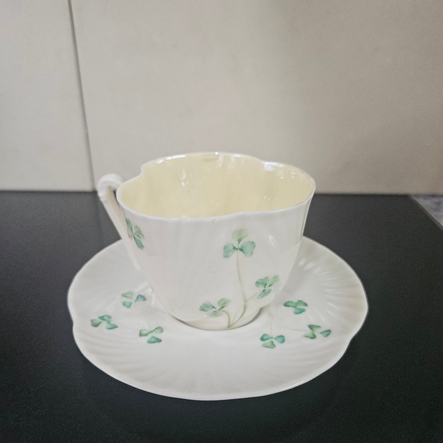 Belleek Coffee Cup and Saucer In Shell Pattern